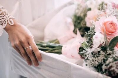 Kyoto Tokyo Japan Elopement Wedding Photographer, Planner & Videographer | A bride's hand holding a bouquet of flowers.