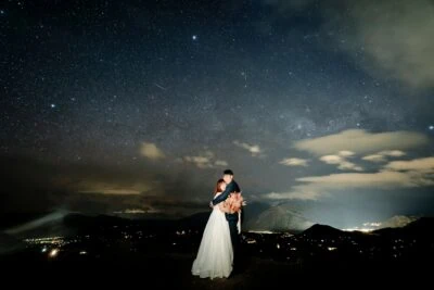 Kyoto Tokyo Japan Elopement Wedding Photographer, Planner & Videographer | A bride and groom embracing under the stars, captured beautifully in Ayaka Morita's portfolio.