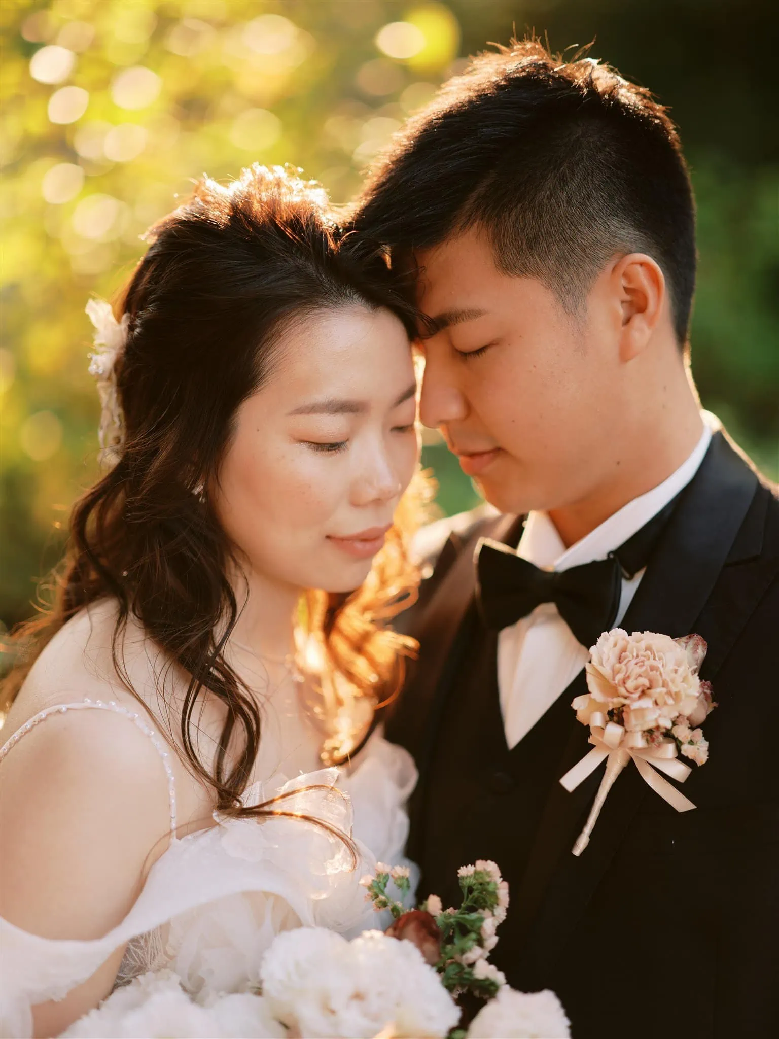 Kyoto Tokyo Japan Elopement Wedding Photographer, Planner & Videographer | A Japanese bride and groom embracing each other in a park, beautifully captured by an exceptional elopement photographer.